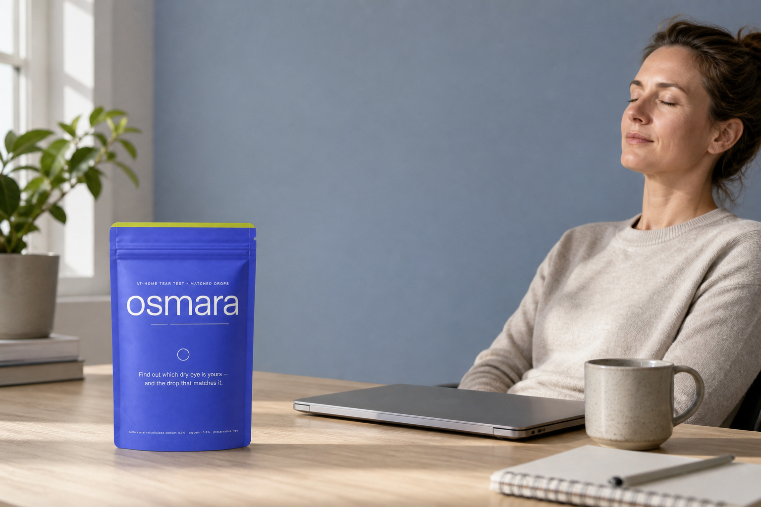 The osmara pouch on a wood desk in a late-afternoon apartment work nook
